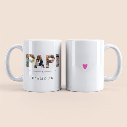 Mug blanc. Lettres "PAPI" contenant des photos personnalisées et texte "D'amour" à gauche. Cœur rose au centre à droite.