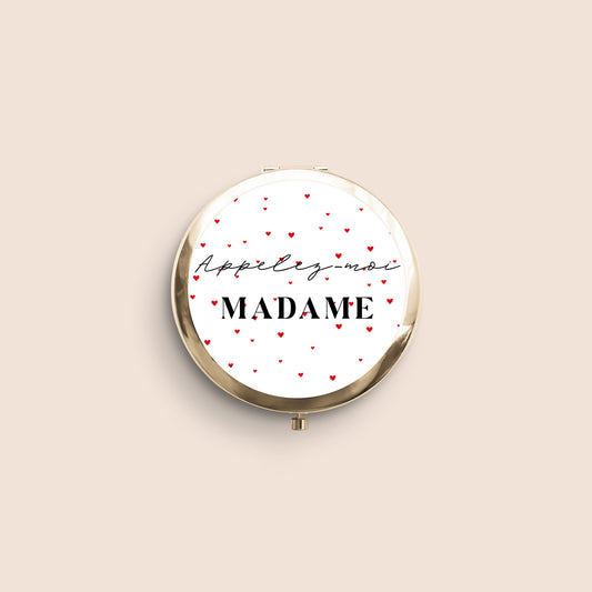 miroir de poche doré avec petits cœurs rouges et inscription Appelez-moi MADAME